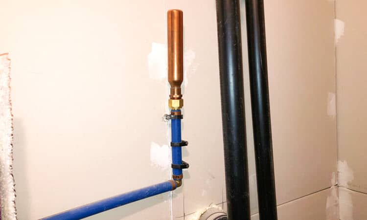 Water hammer arrestor whole house